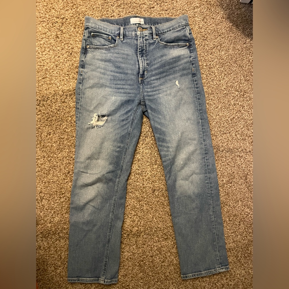 Straight Leg Light Blue Women’s Jeans with Subtle Distress